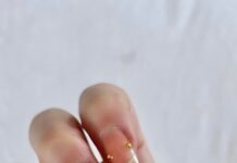 Kat Dennings Did Her Pierced Chrome French Manicure Herself — See Photos