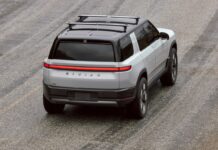 Rivian cuts hundreds of workers after R2 deliveries start