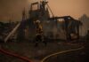France orders evacuation of peninsula as hundreds flee wildfires by boat