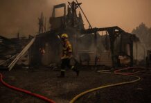France orders evacuation of peninsula as hundreds flee wildfires by boat