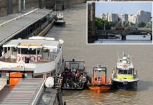 Police boat crashes into bridge in central London, sending officers into the Thames