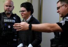 Teen pleads guilty in school shooting in Georgia that killed four