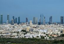 Iran threatens US hotels, banks and Trump properties as attacks reported in Bahrain, Iraq and Jordan