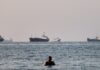 Tanker on fire off coast of Oman after being hit by projectile