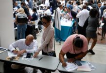 US employers add 57K jobs in June as hiring continues at a healthy clip