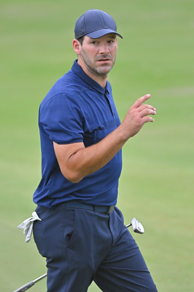 tony-romo-walks-ninth-green-135395311.jpg