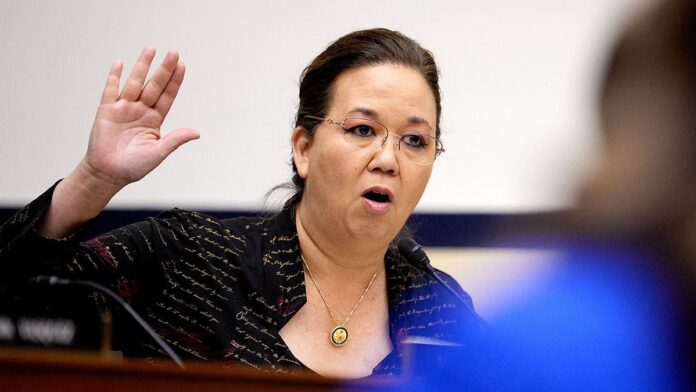 jill-tokuda-raising-hand-1.jpg