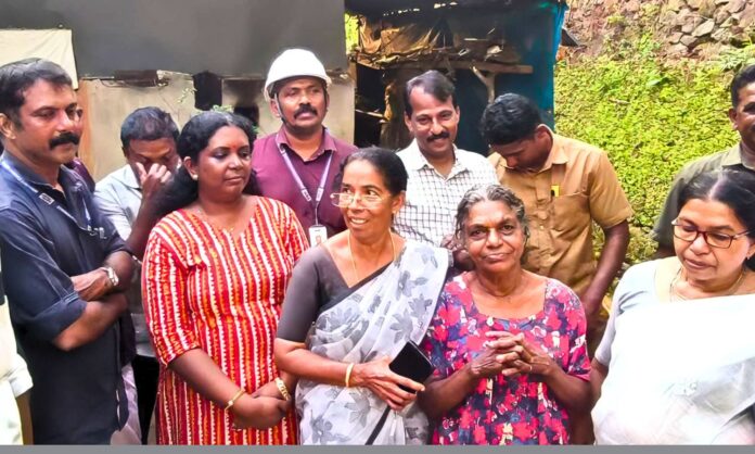 2090779-kseb-giving-free-connection-to-old-woman.jpg