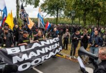 Dutch riot police break up violent far-right protest in The Hague