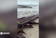 Watch: Shipwreck uncovered on Nantucket island during nor’easter storm