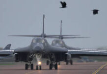 UK police arrest five men amid bomb alert outside US air base