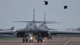 UK police arrest five men amid bomb alert outside US air base