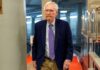 Mitch McConnell swarmed by security as reporter pleads: ‘Can you say a word for us?’