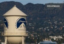 Paramount agrees invest $1.5 billion in domestic movies and create a board for editorial independence at CNN, CBS as part of deal for Warner Bros.