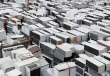 Tens of thousands of fridge freezers left at docks as household collections suspended