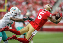 49ers wide receivers Demarcus Robinson, Mike Evans exit early with apparent injuries