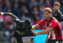 Swansea go top after victory at Lincoln