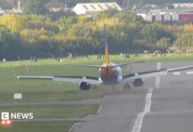 Plane veers off runway at Birmingham Airport during storm