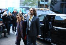 Russell Brand arrives at court for rape trial with third complainant expected to give evidence