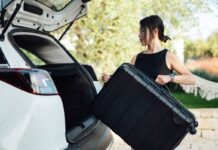 Woman spotted being escorted to car then people realise who she is