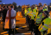 Anti-migrant protesters gather as small boat heads for south coast