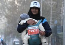 Woman Runs Kashmir Half-Marathon With One-Year-Old Son in Baby Carrier