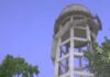 Farmers Climb Water Tank, Oppose Gouravelli Canal