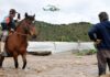 Residents airlifted to safety after flooding in central Chile