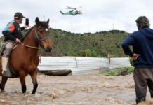 Residents airlifted to safety after flooding in central Chile