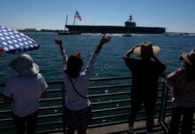 Thousands turn out to welcome weary USS Lincoln sailors after fraught stretch at sea