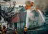 Evacuation orders as fast-moving California wildfire burns homes