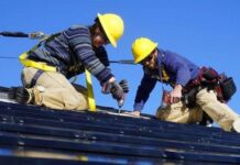 Why are more roofs not made of solar tiles?