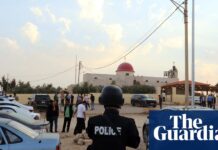 Seven killed and 40 injured after gunmen open fire at church funeral in Jordan