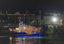 Two people die trying to cross Channel as anti-migrant protesters clash with police in Gosport