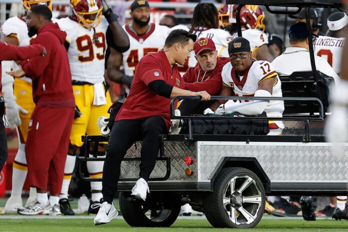 carted-off-field-first-half-145774359.jpg