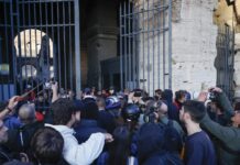 Protestors waving Palestinian flags storm Roman Colosseum gates as unrest grows