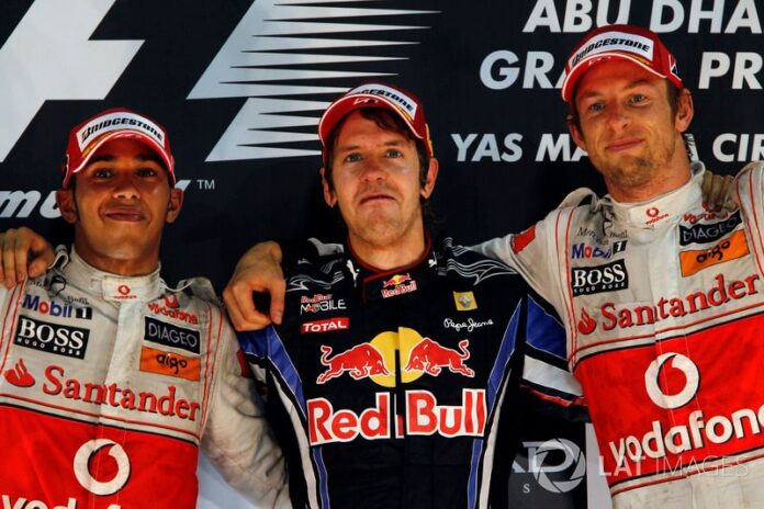 f1-abu-dhabi-gp-2010-podium-race-winner-sebastian-vettel-red-bull-racing-second-place-lewi.jpg