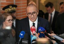 Deadly shooting in Paris suburb may be terrorist act, officials say