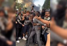 French mayor tear-gassed after shielding protesters from police