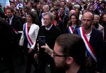 Presidential hopeful Melenchon joins France school protest march