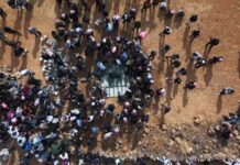 Funeral held for family killed in Jordanian airstrikes in Syria
