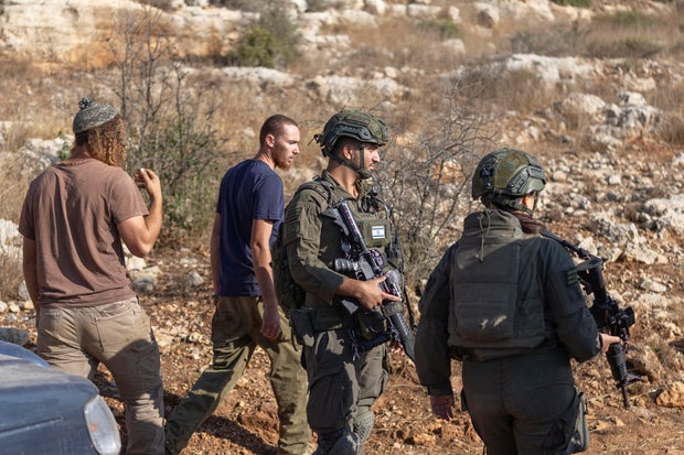 west-bank-settlers-2300422006.jpg